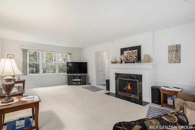 4102 Highgate Rd, Norton Shores, MI 49441 - carpeted living area with a fireplace