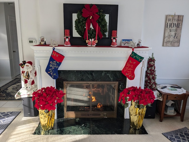 interior details featuring a high end fireplace