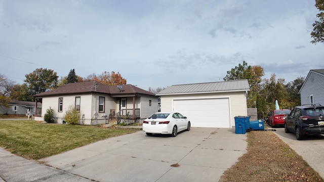 ranch-style home with a front lawn and a garage