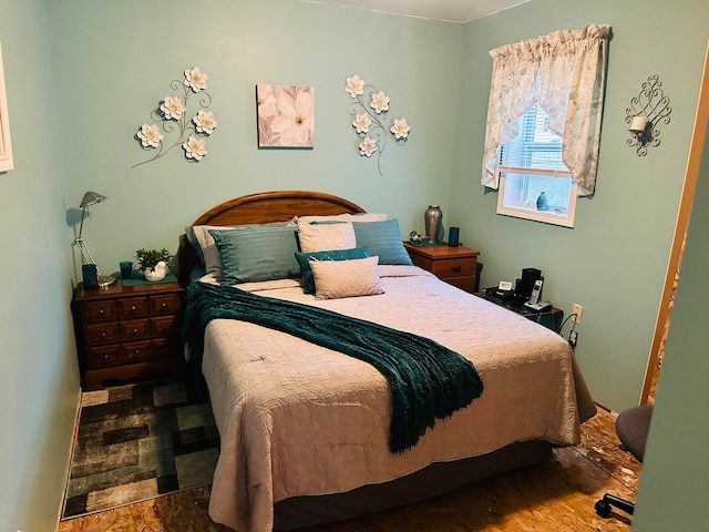 bedroom featuring wood-type flooring