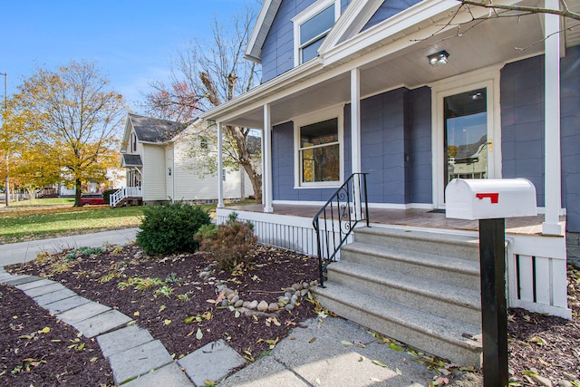 doorway to property featuring a porch