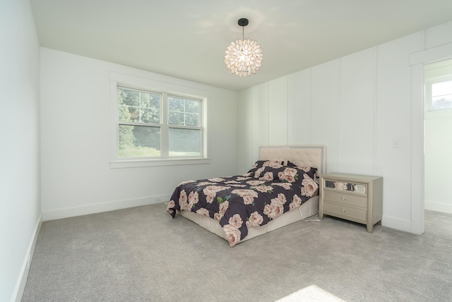 bedroom featuring light carpet