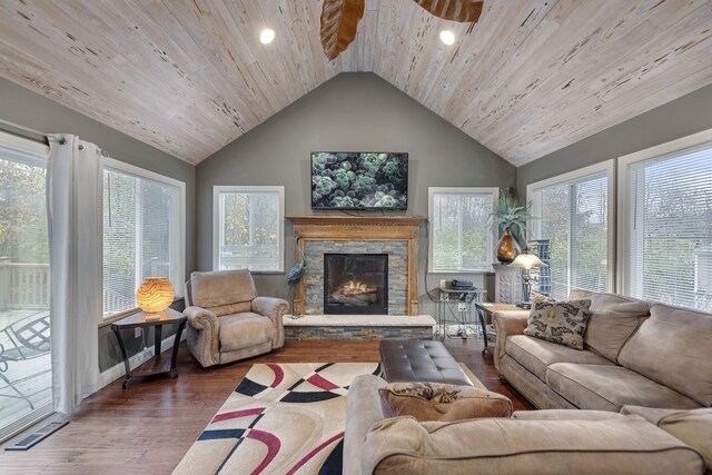 living room with a fireplace, hardwood / wood-style floors, high vaulted ceiling, and wood ceiling