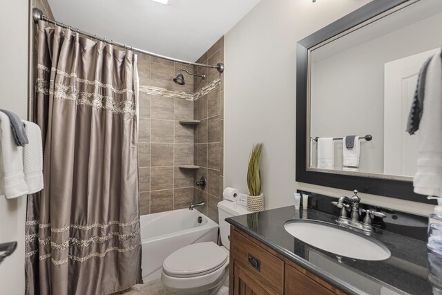 full bathroom featuring vanity, shower / bath combination with curtain, and toilet