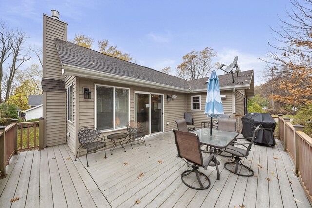 wooden terrace with grilling area