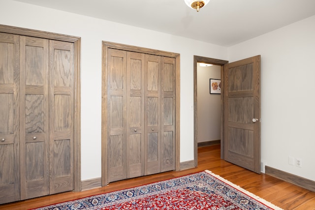 unfurnished bedroom featuring light hardwood / wood-style floors