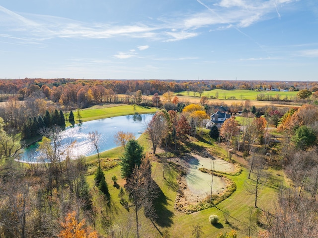 birds eye view of property with a water view and a rural view