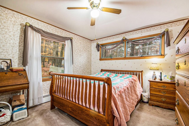 bedroom featuring light carpet, multiple windows, and ceiling fan