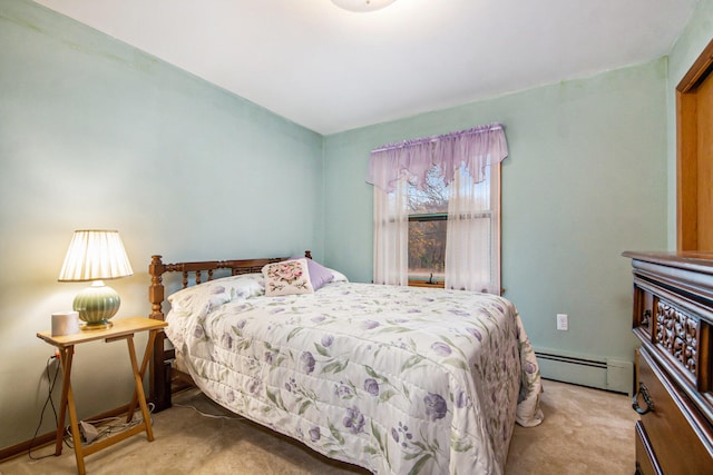 carpeted bedroom with a baseboard radiator