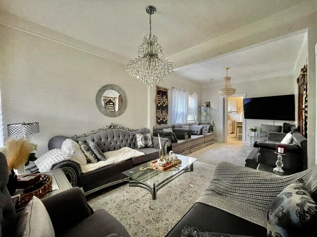 living room with beam ceiling, ornamental molding, and an inviting chandelier