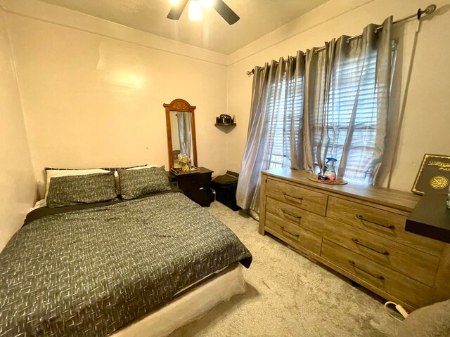 bedroom featuring carpet flooring and ceiling fan