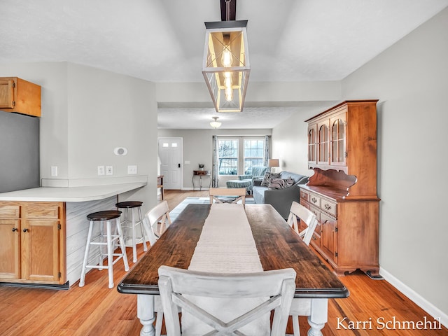 dining room featuring light wood-type flooring