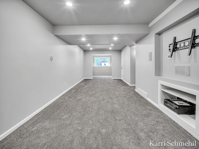 unfurnished living room with carpet