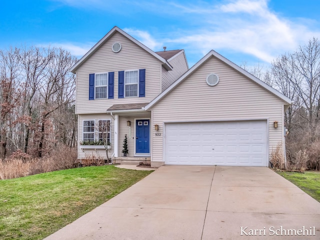 front of property with a garage and a front yard