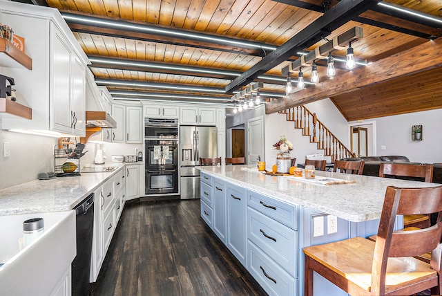 kitchen with black appliances, white cabinetry, and wooden ceiling