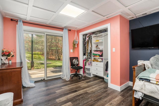 bedroom with a closet, coffered ceiling, dark hardwood / wood-style floors, and access to outside