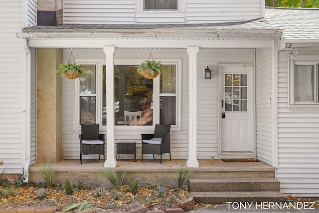 doorway to property with covered porch