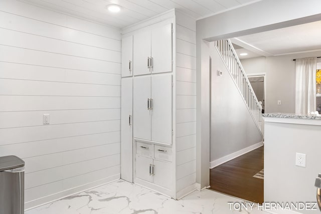 bathroom with wooden walls