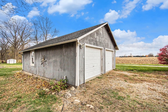 garage with a rural view