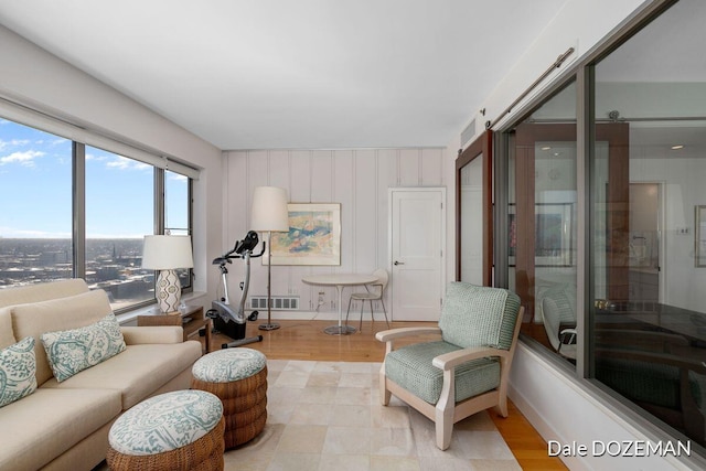 living room with light hardwood / wood-style flooring