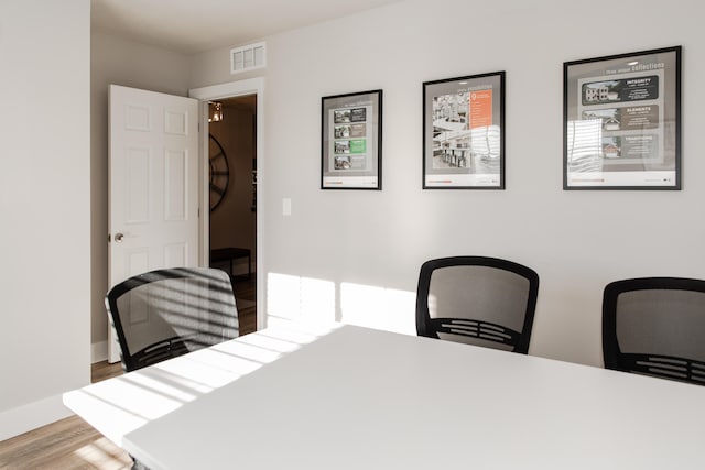 dining room featuring hardwood / wood-style flooring