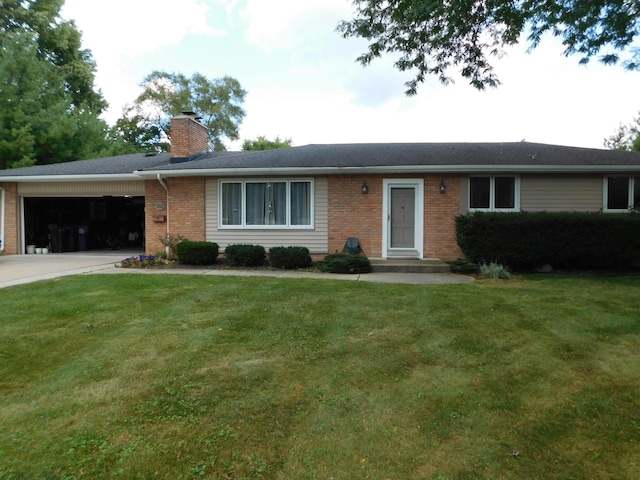 ranch-style home with a front yard and a garage