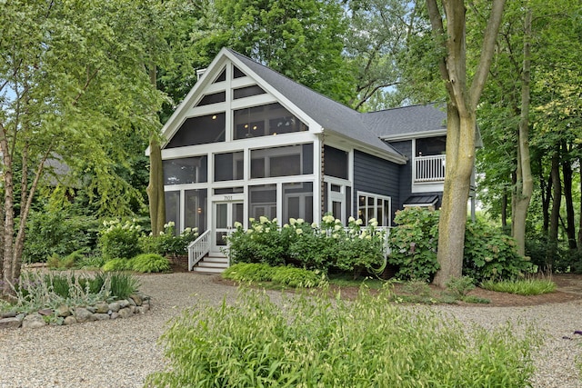 view of front facade featuring a sunroom