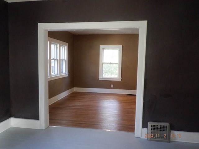 spare room featuring hardwood / wood-style flooring