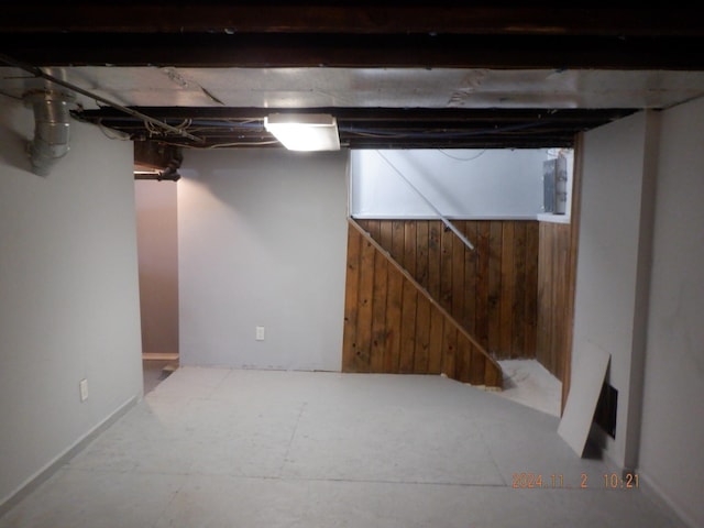 basement with wooden walls