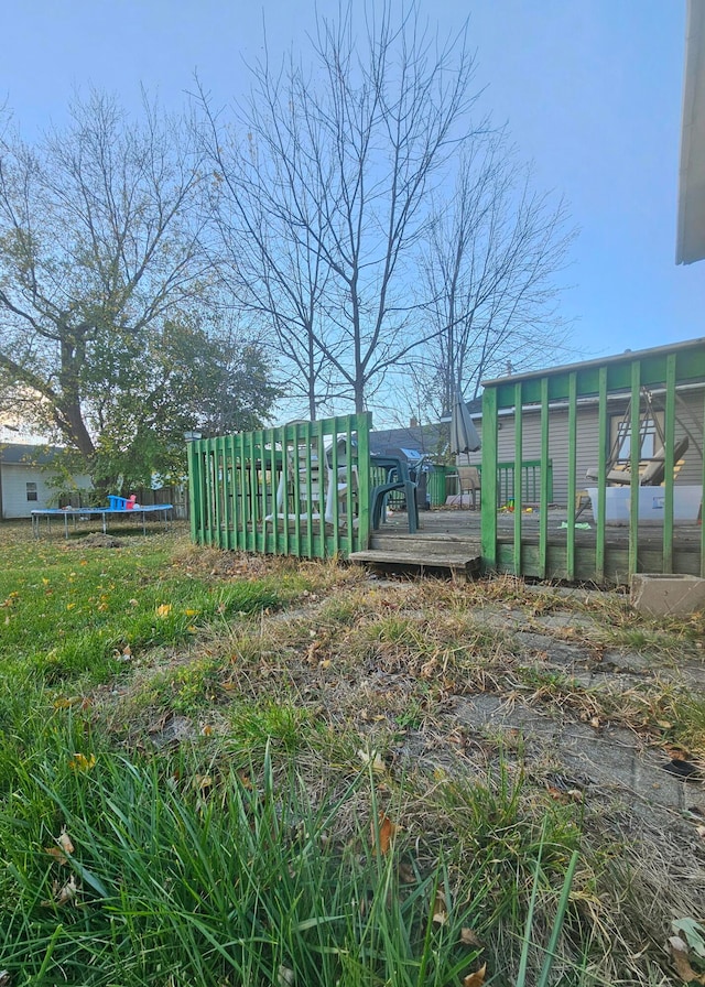 view of yard featuring a wooden deck