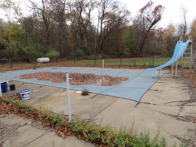 view of swimming pool with a patio area