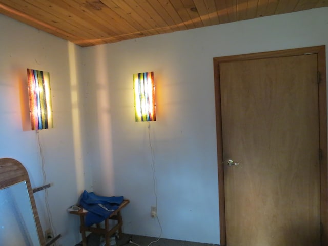 interior space featuring wooden ceiling