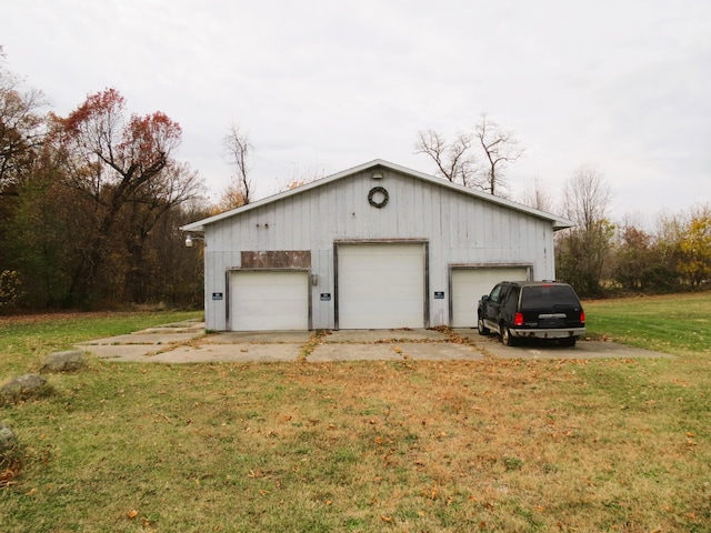 garage with a lawn