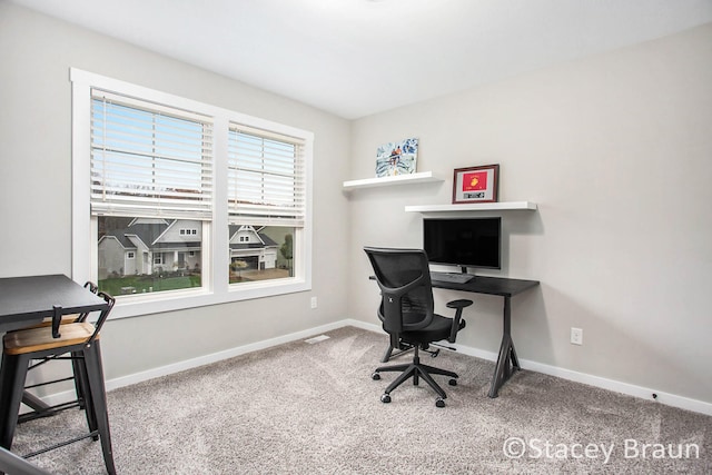 home office featuring carpet flooring