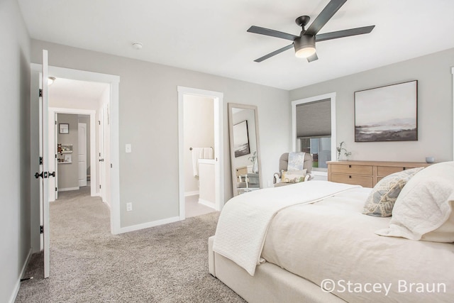 bedroom with connected bathroom, light carpet, and ceiling fan