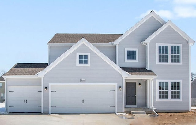 view of front of house with a garage