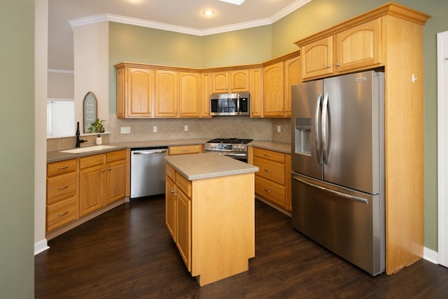 kitchen with dark hardwood / wood-style floors, a center island, sink, and stainless steel appliances