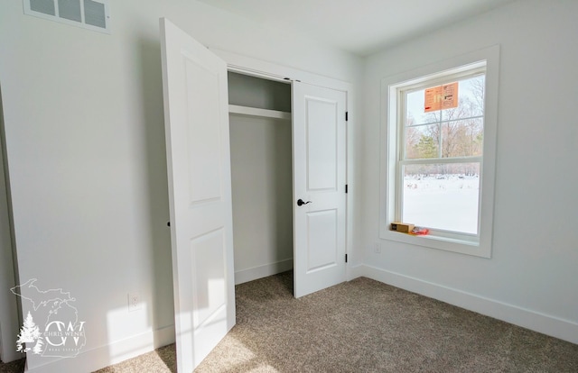 unfurnished bedroom with carpet