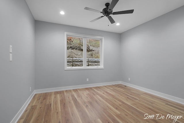 unfurnished room with light hardwood / wood-style floors and ceiling fan