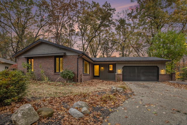 single story home featuring a garage