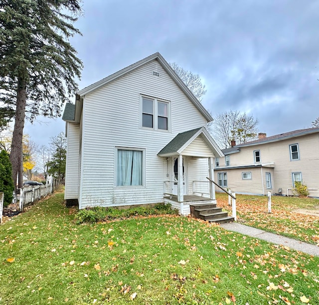 view of front of property with a front lawn