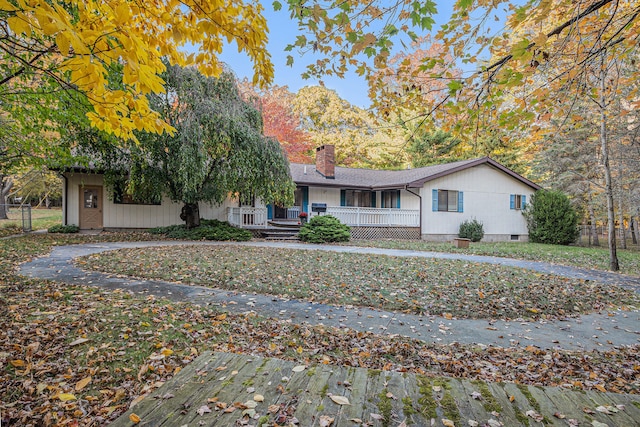 single story home with covered porch