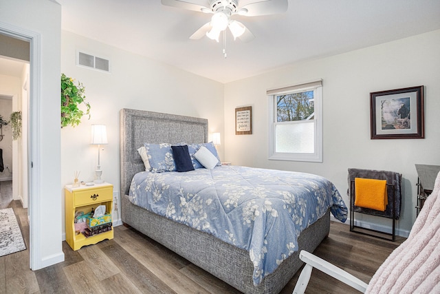 bedroom featuring hardwood / wood-style flooring and ceiling fan