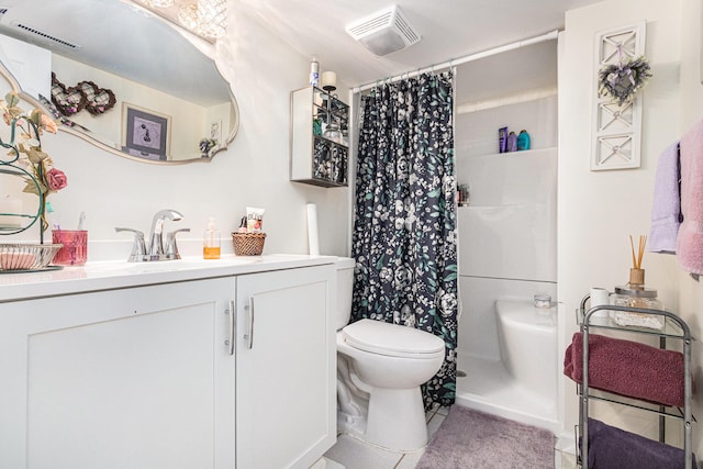 bathroom with tile patterned flooring, vanity, toilet, and a shower with curtain