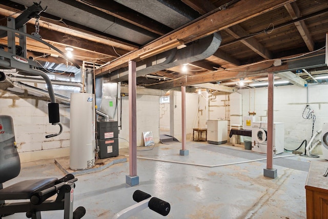 basement featuring gas water heater, independent washer and dryer, and heating unit