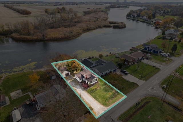 bird's eye view featuring a water view and a rural view