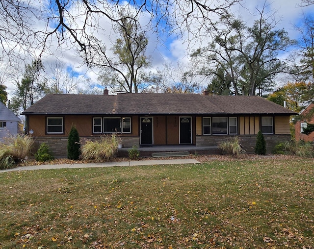 ranch-style home with a porch and a front yard