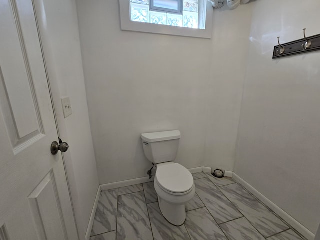 bathroom featuring toilet