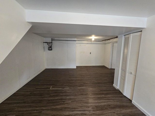 basement featuring dark wood-type flooring