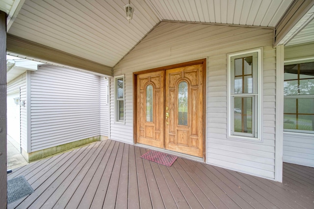 doorway to property with a deck